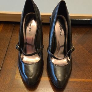 Xappeal Brown Heels with Classic Mary Jane Design